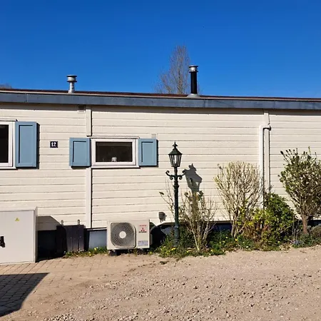 Waterlodge Met Waterfiets Op Monumentaal Σαλέ *